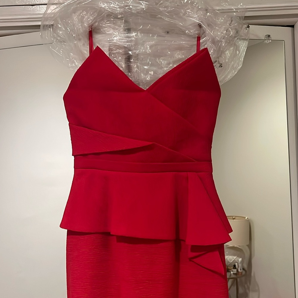 Gorgeous sexy red strapless evening gown with a fitted bustier top
